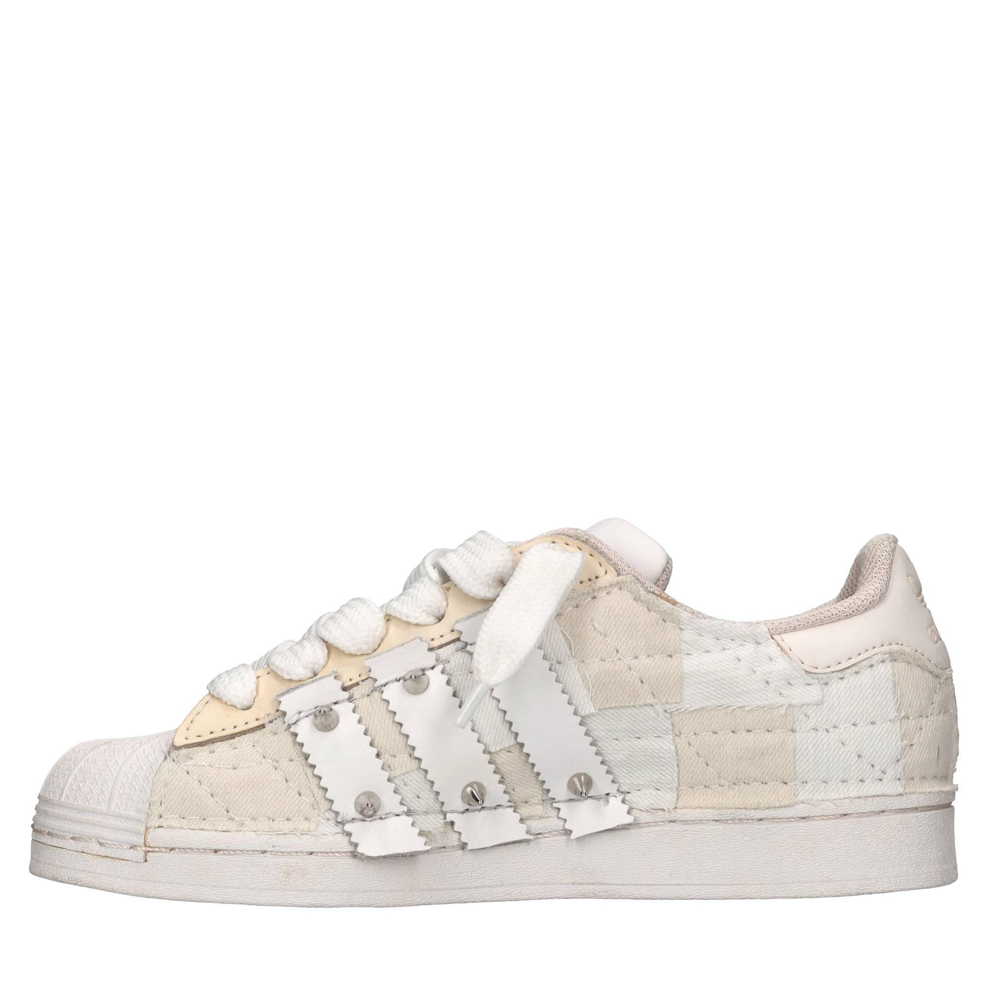 Sneakers in ecopelle e tessuto 