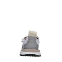 Sneakers in pelle e tessuto 
