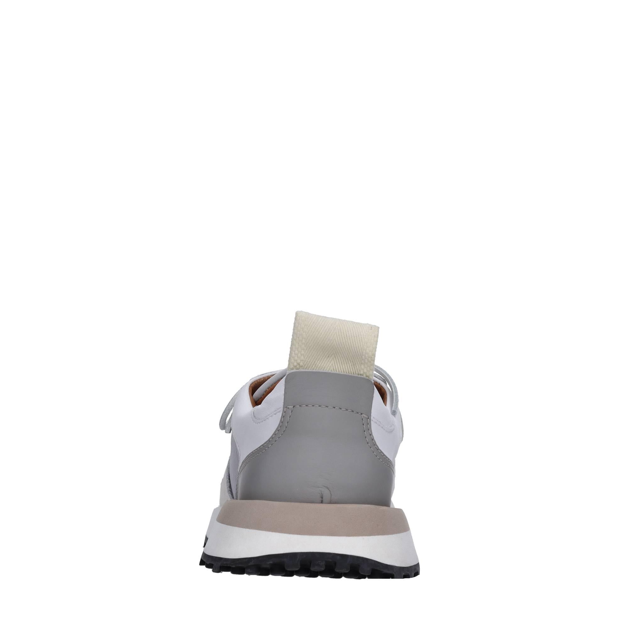 Sneakers in pelle e tessuto 