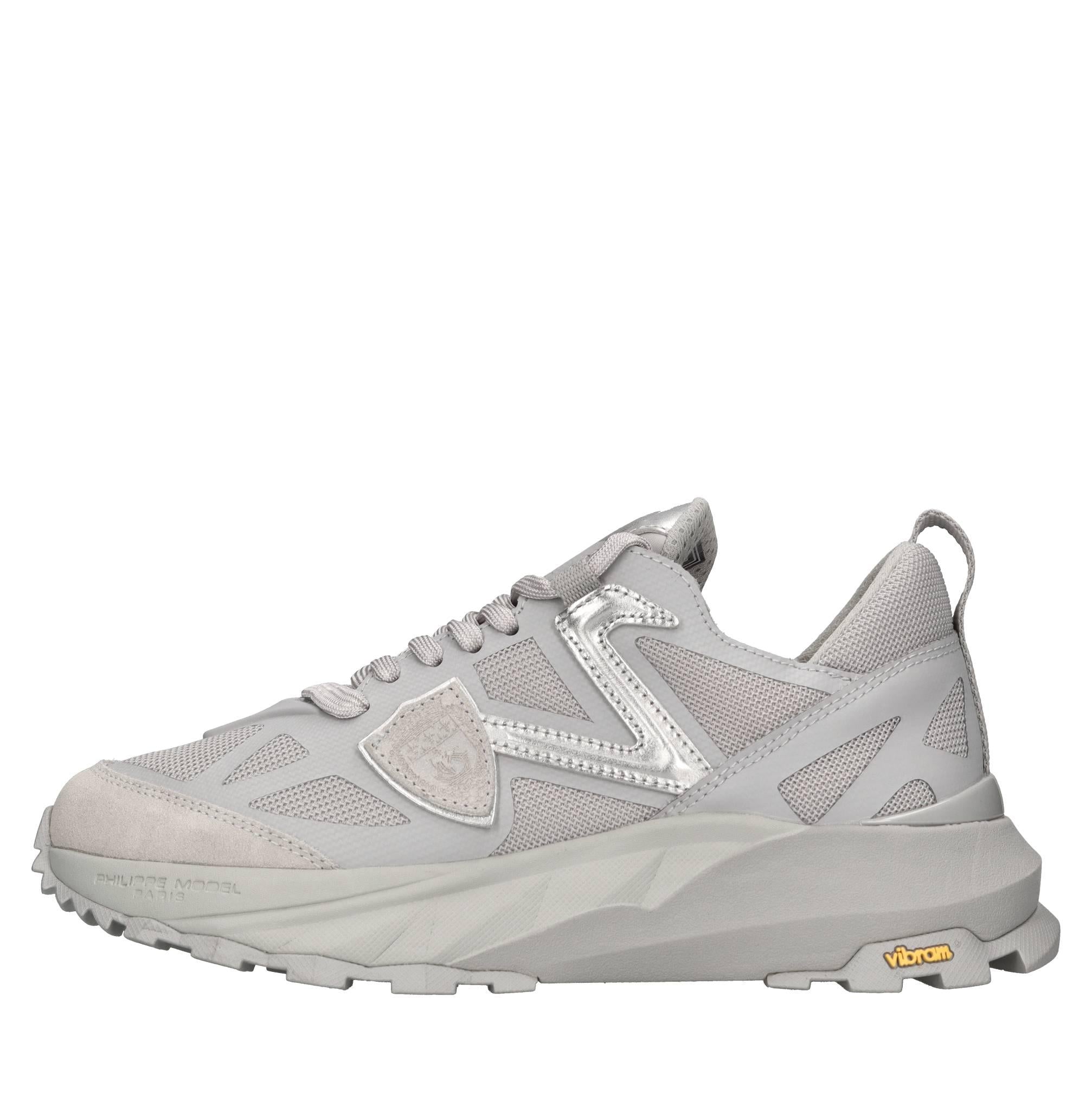 Sneakers in ecopelle e tessuto 