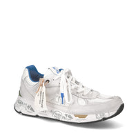Sneakers in pelle scamosciata e tessuto 