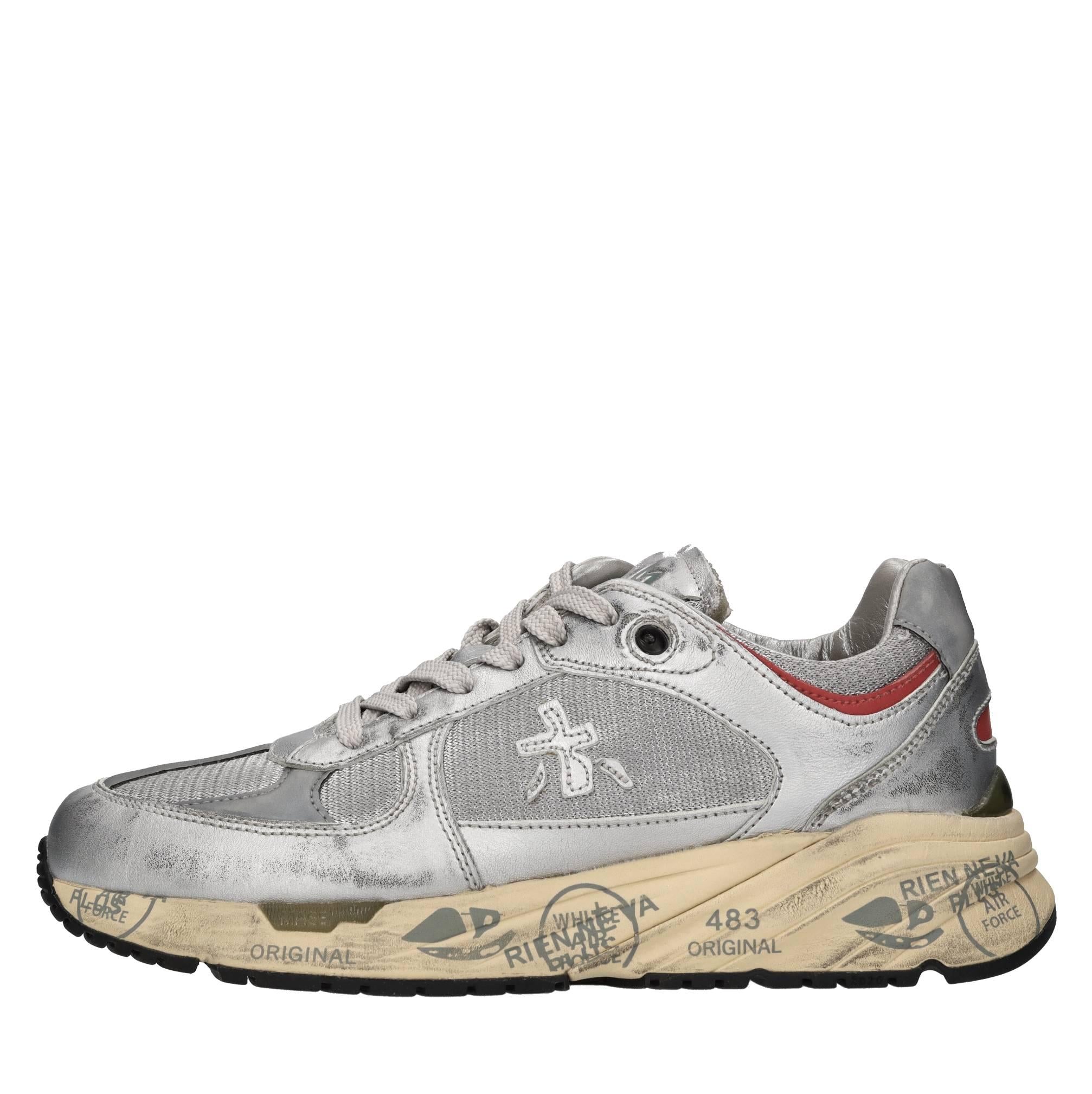 Sneakers in pelle, ecopelle e tessuto 