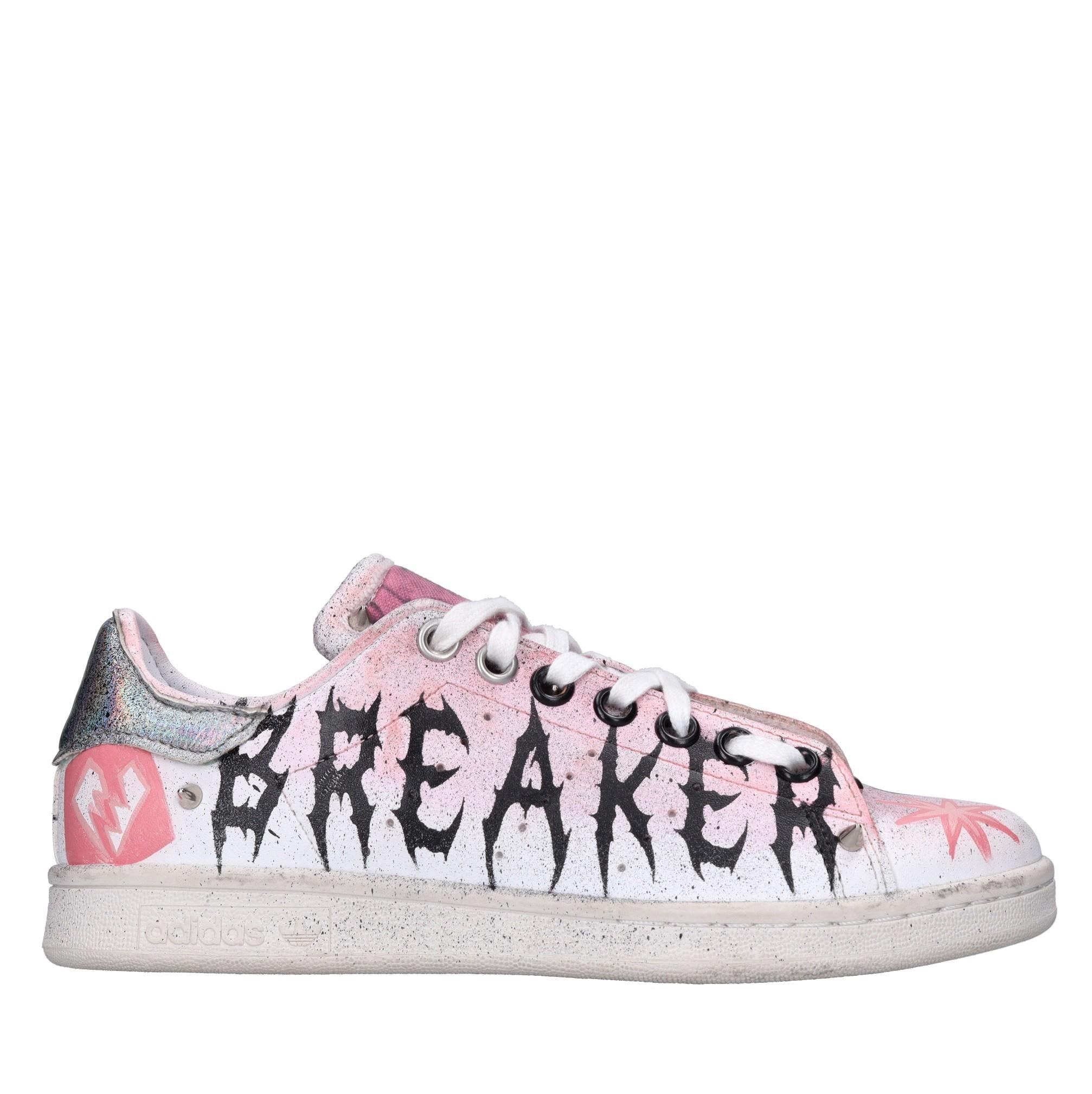 Sneakers in ecopelle e tessuto 