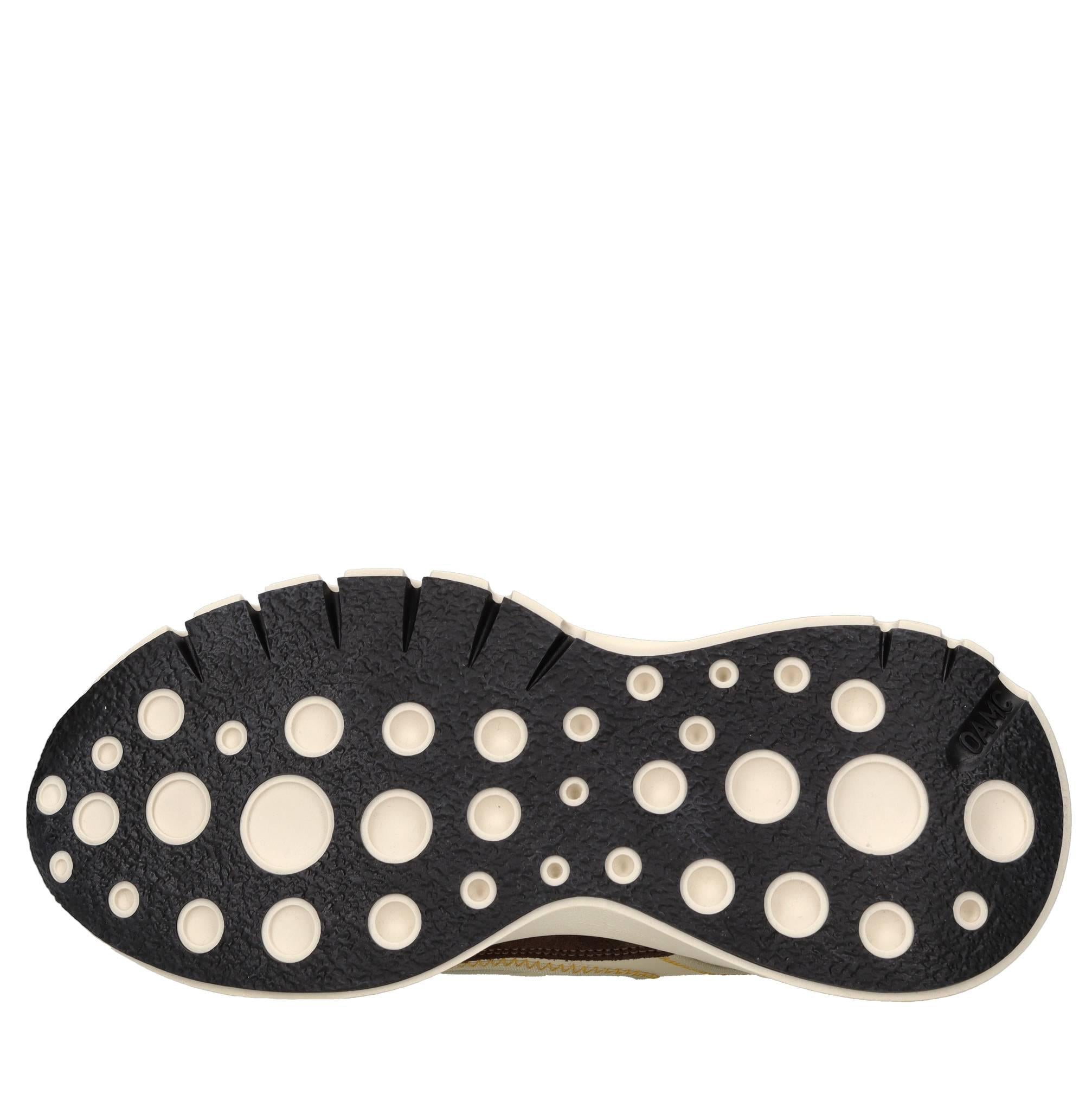 Sneakers in pelle e tessuto 