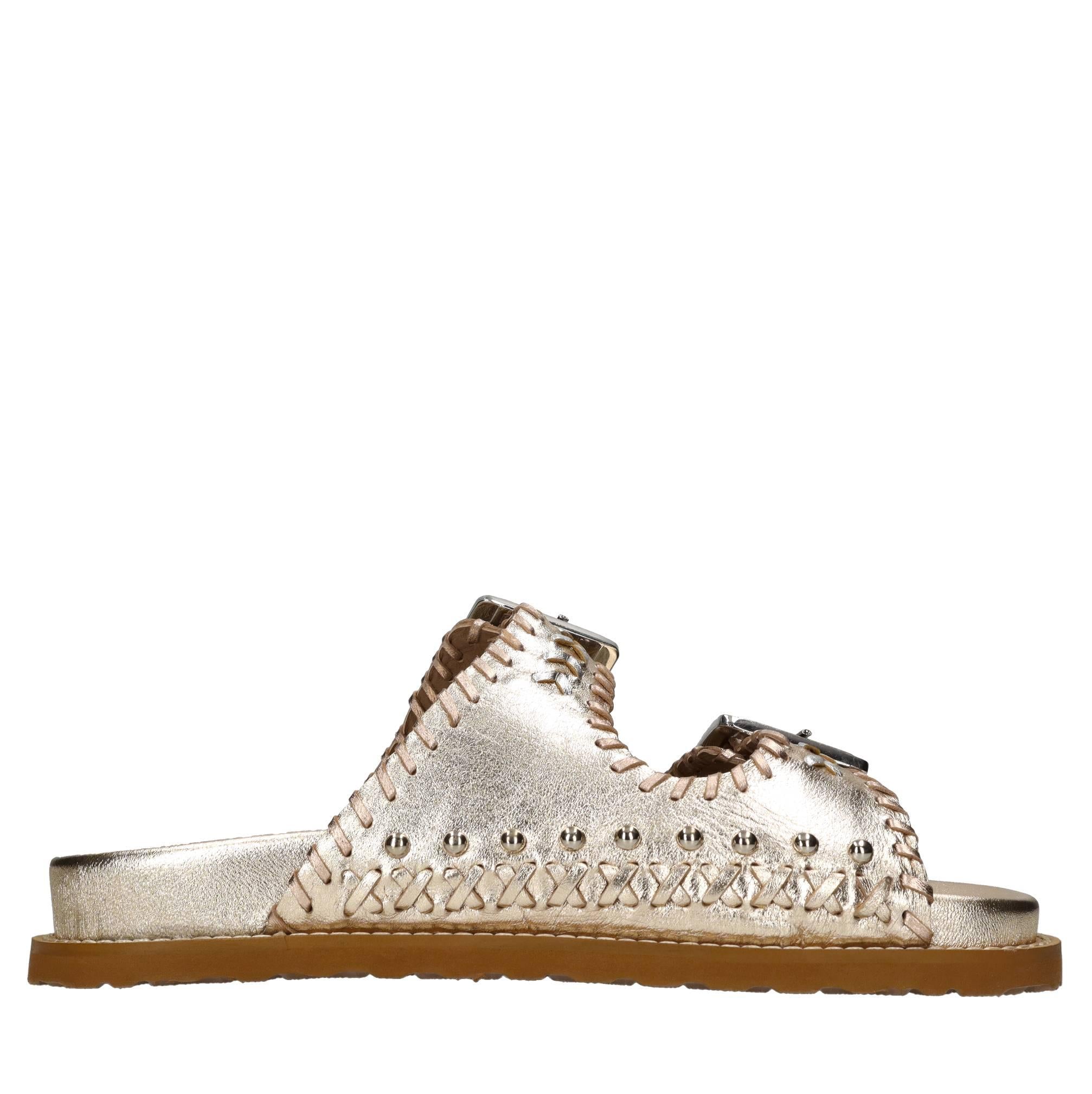 Mules in pelle con borchie 