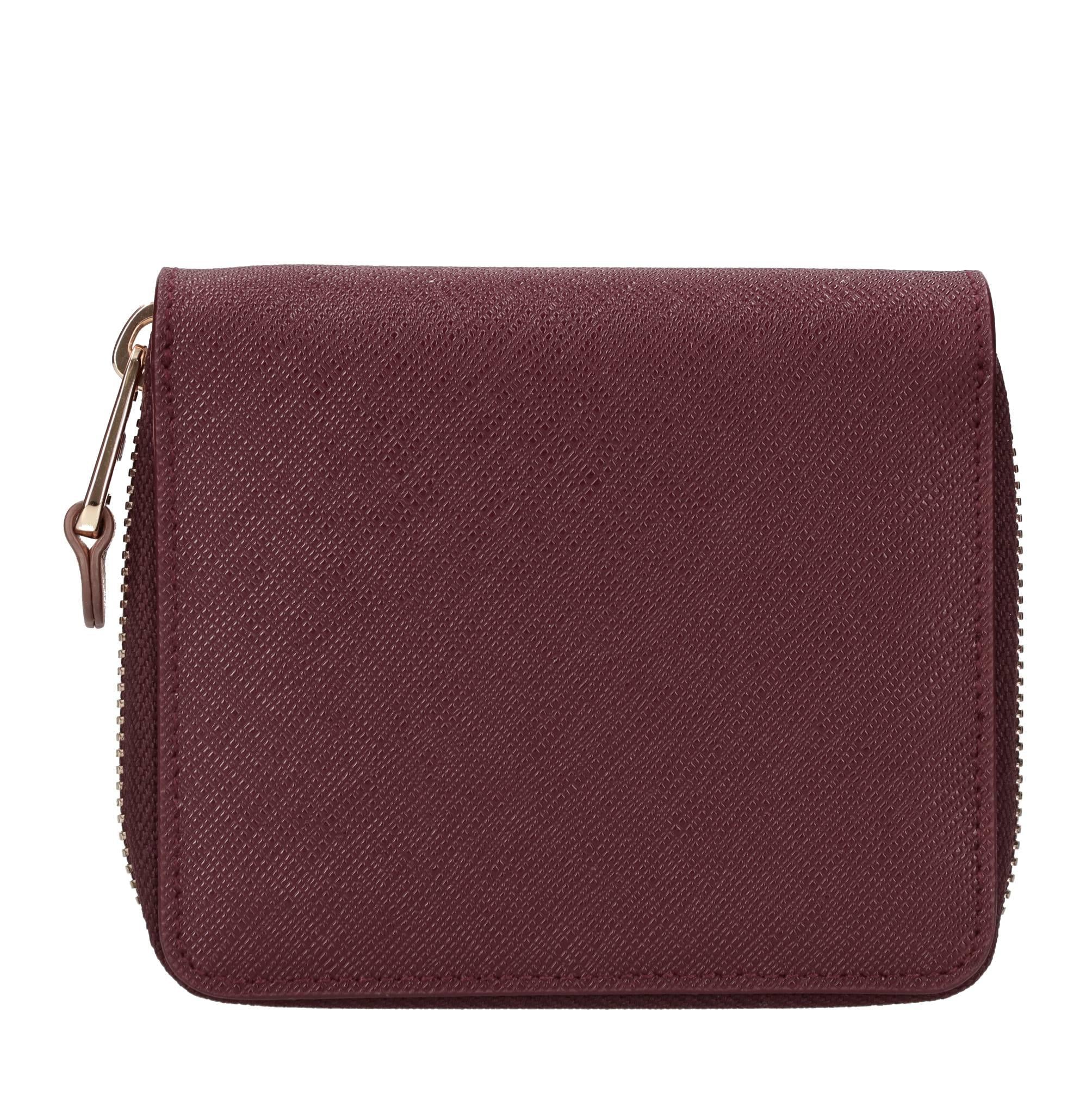 Portafoglio zip around piccolo in pelle ed ecopelle 