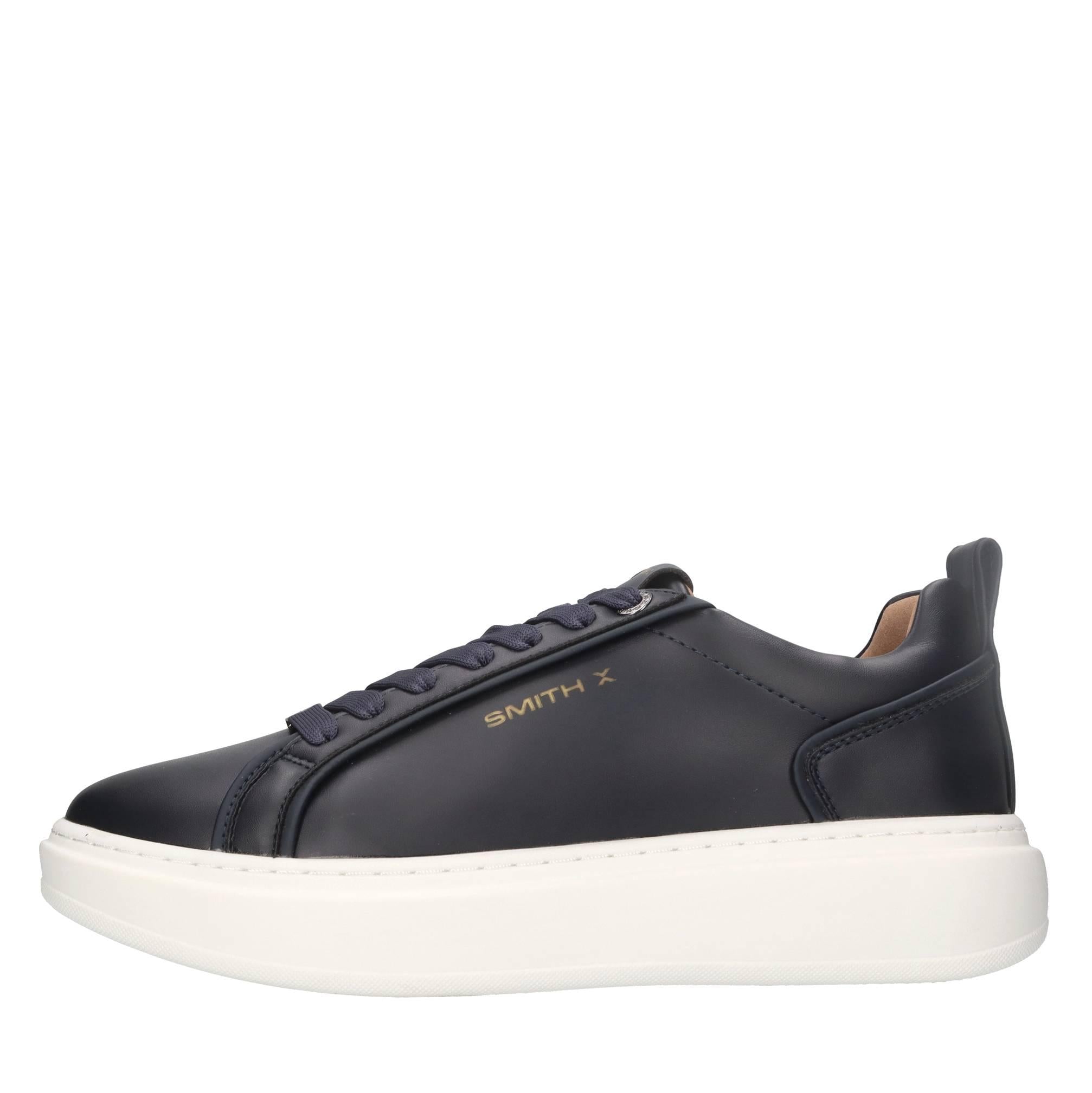Sneakers in ecopelle e tessuto 