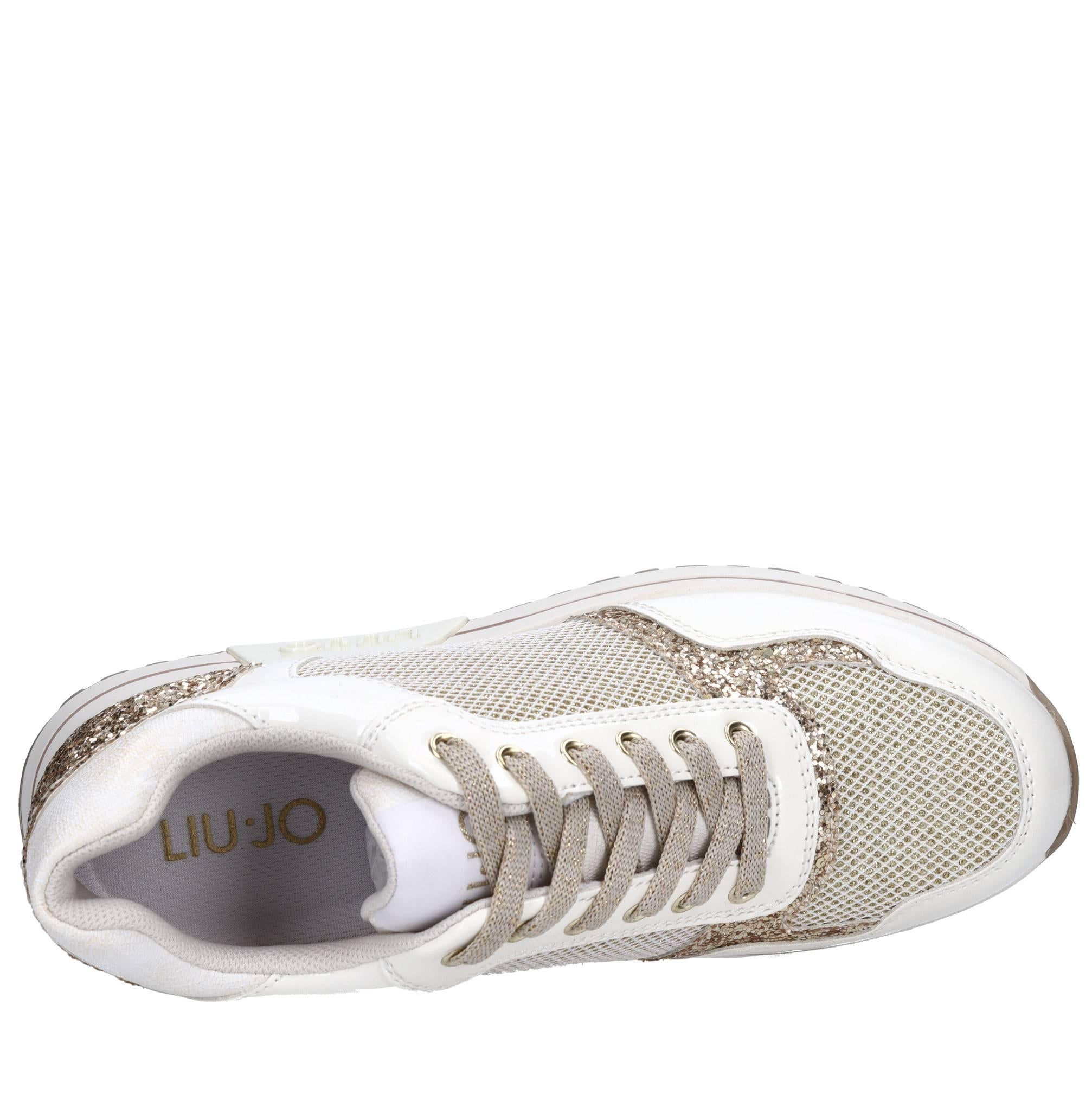 Sneakers in ecopelle e tessuto 