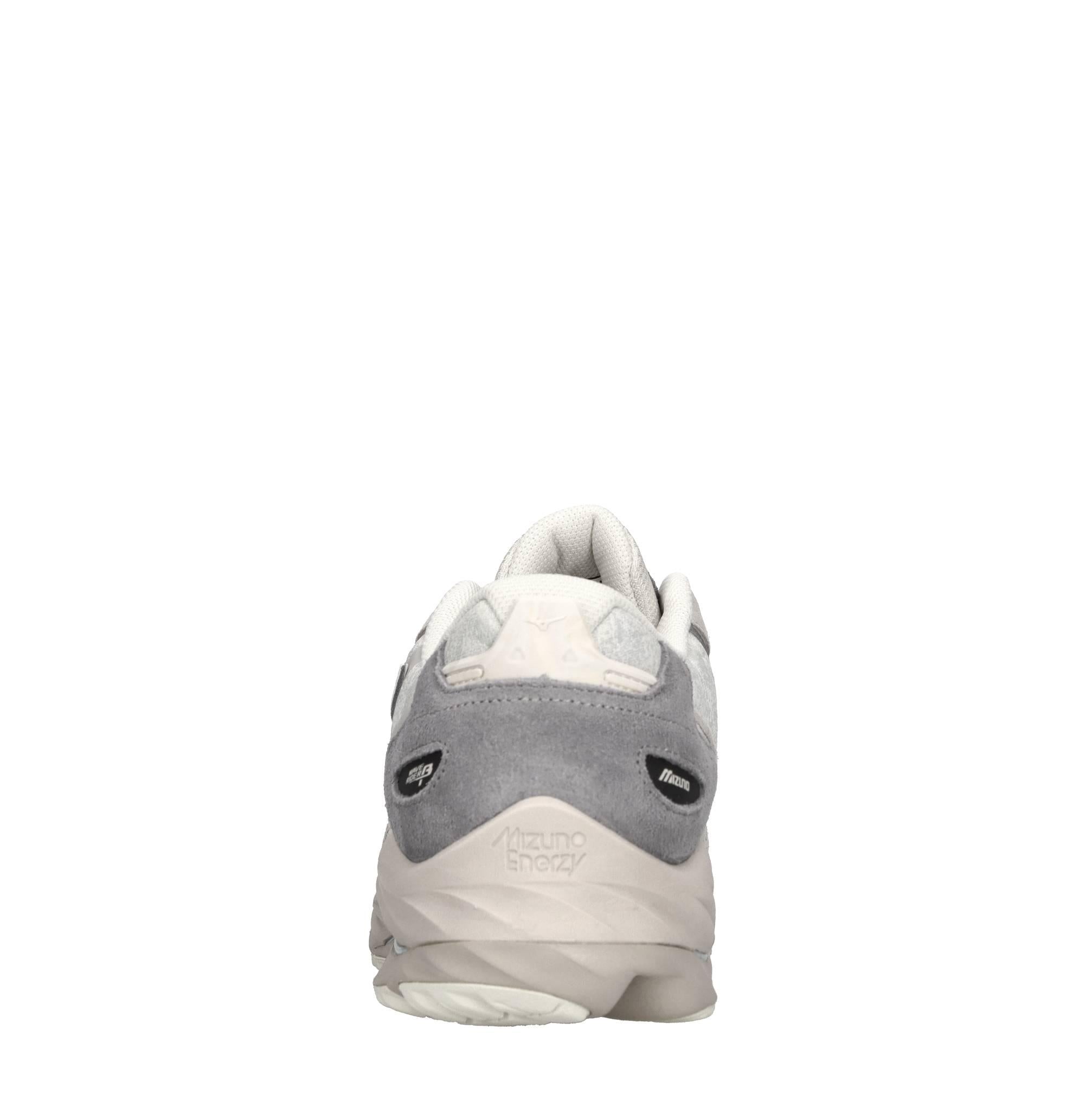 Sneakers in pelle e tessuto 