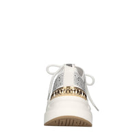 Sneakers in pelle e tessuto 