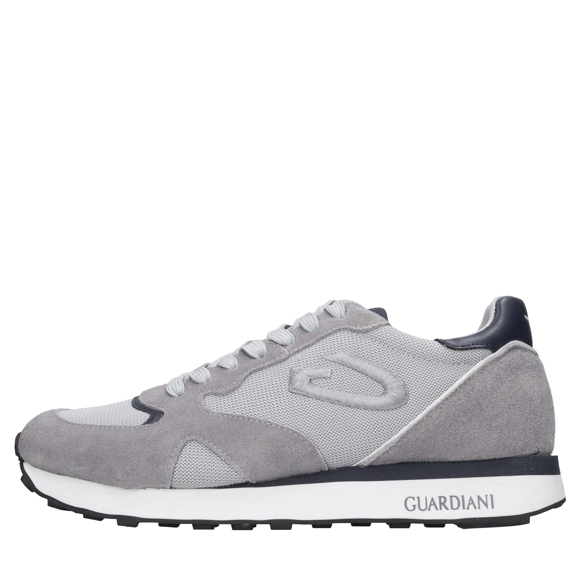 Sneakers in camoscio e tessuto 
