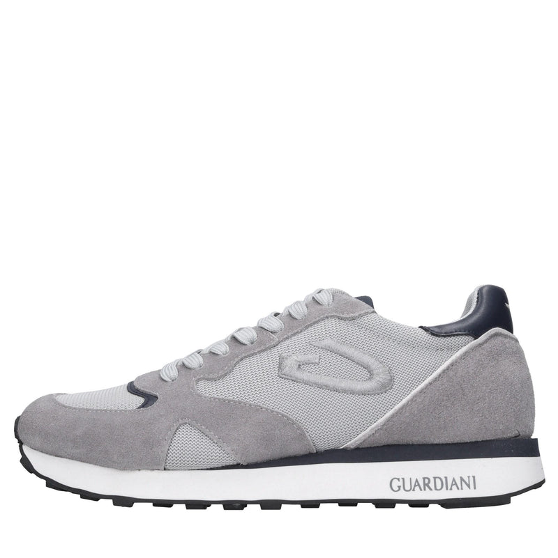 Sneakers in camoscio e tessuto 