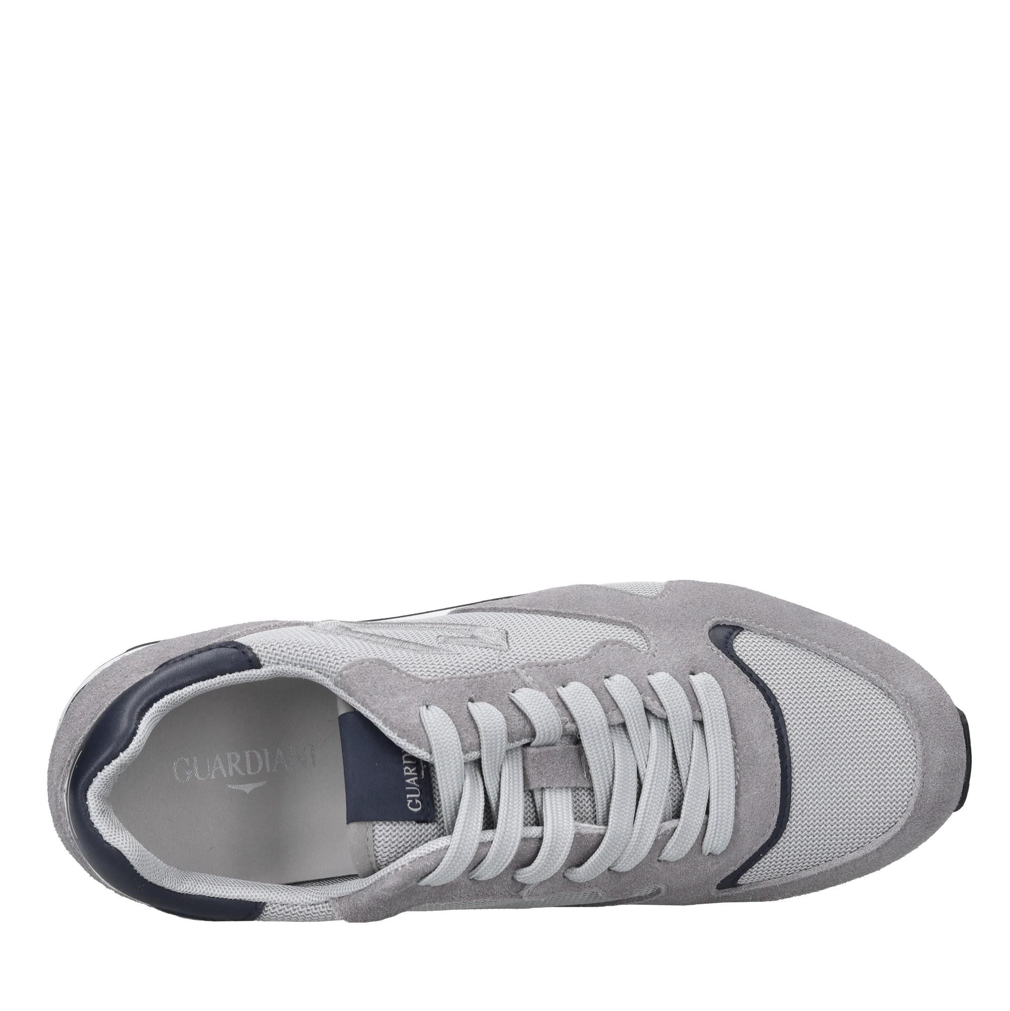 Sneakers in camoscio e tessuto 