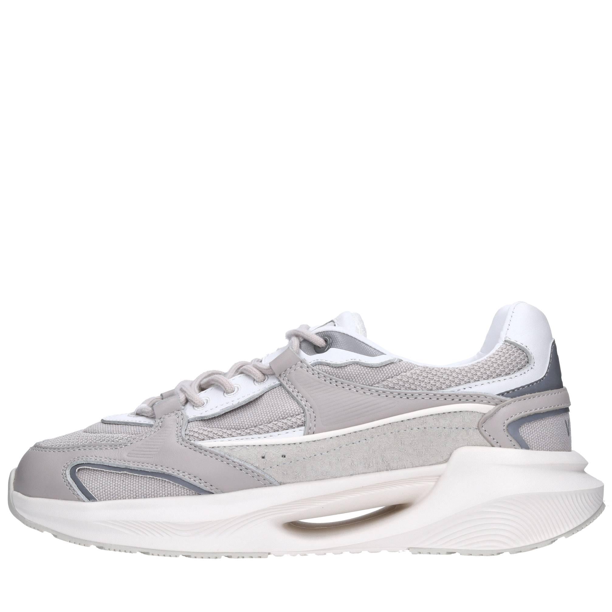 Sneakers in pelle e tessuto 
