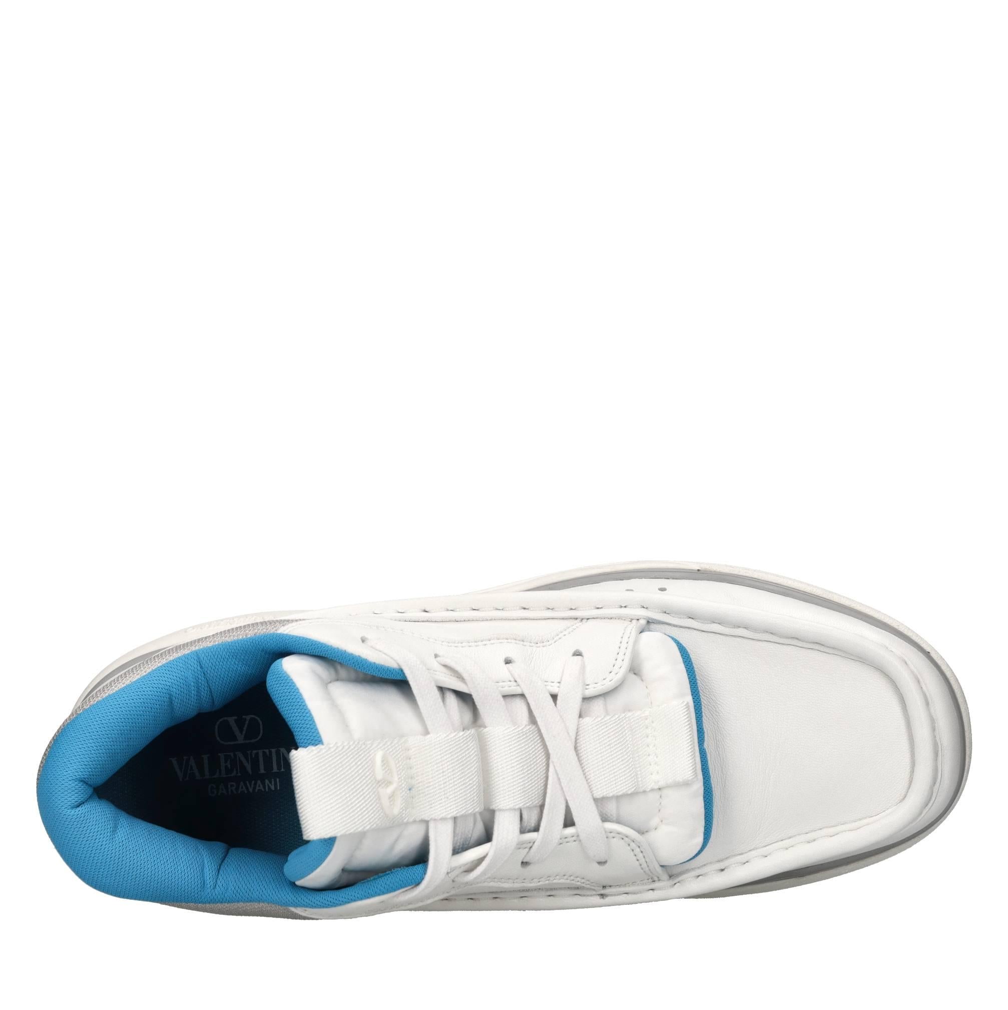 Sneakers in pelle e tessuto 