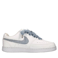 Sneakers in ecopelle e tessuto 