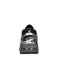 Sneakers in ecopelle e tessuto 