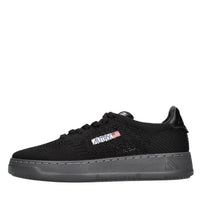 Sneakers in pelle e tessuto 