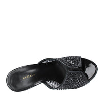 Mules in pelle tessuto e PVC 