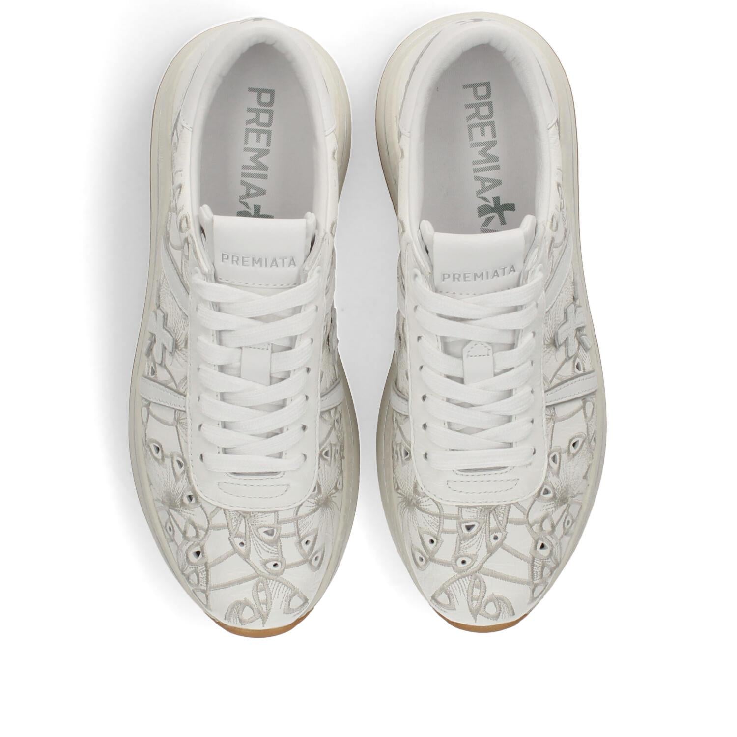 Sneakers in pelle e tessuto 