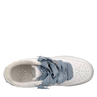 Sneakers in ecopelle e tessuto 
