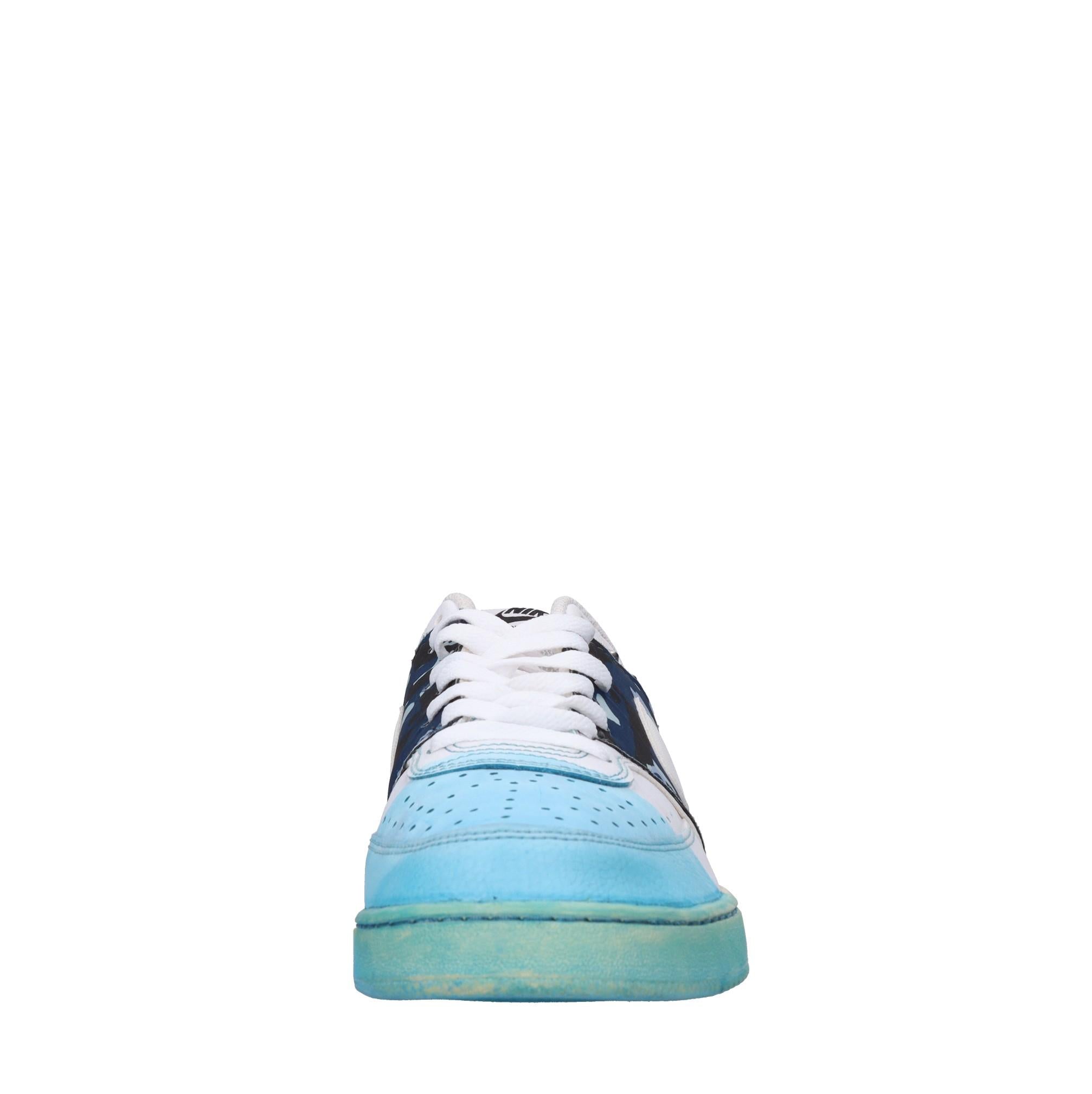 Sneakers in ecopelle e tessuto 
