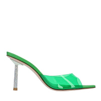 Mules in pelle e PVC. 
