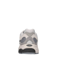 Sneakers in pelle e tessuto 