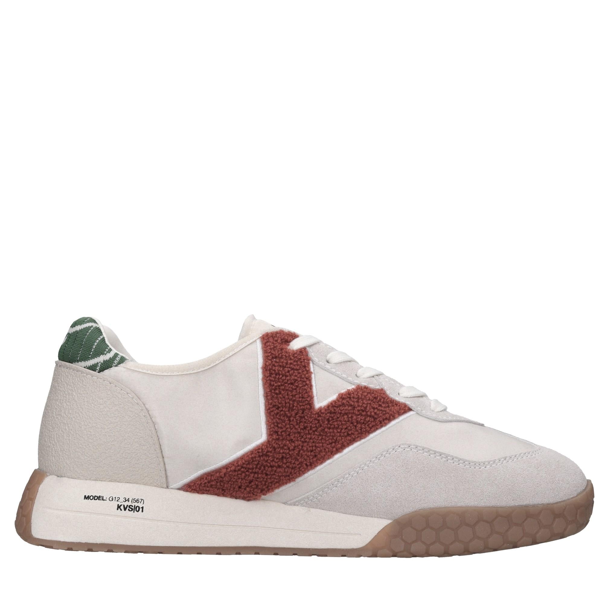 Sneakers in camoscio, tessuto e gomma 
