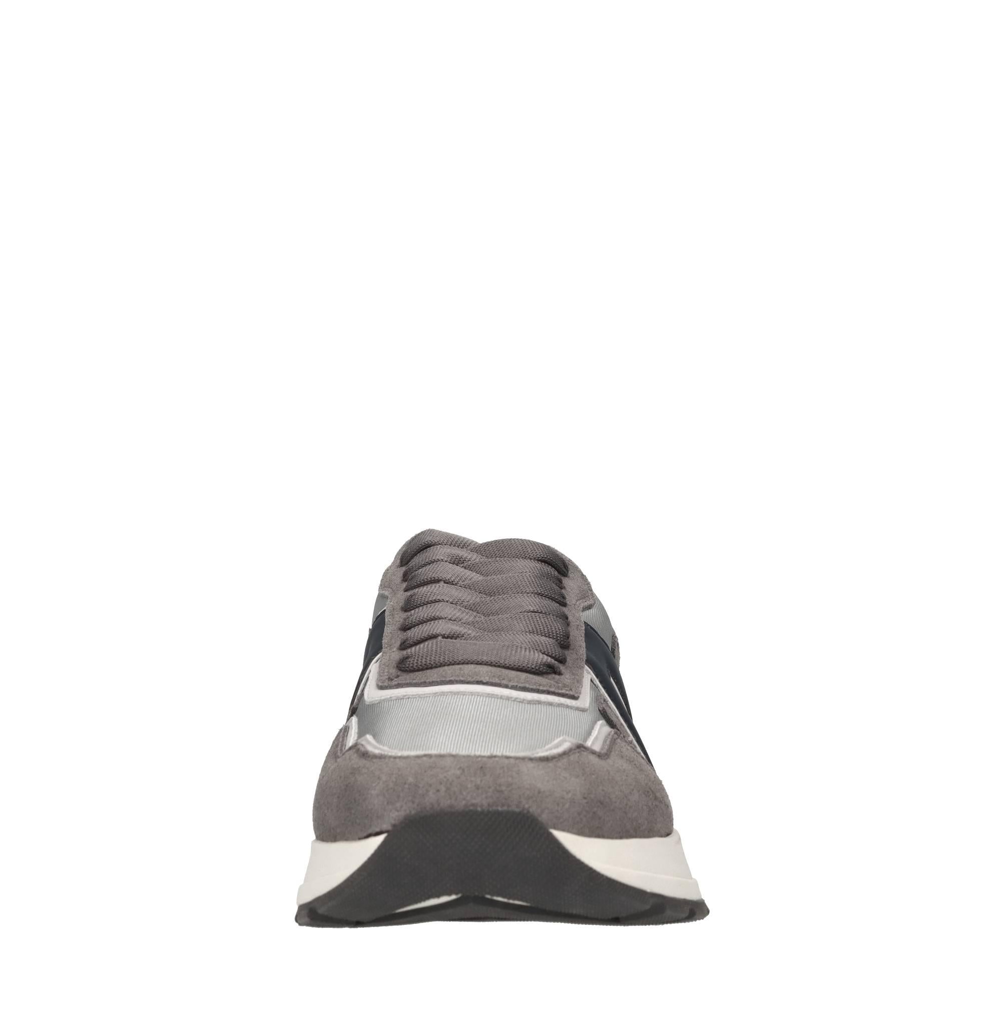 Sneakers in pelle e tessuto 
