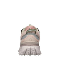 Sneakers in pelle, ecopelle e tessuto 