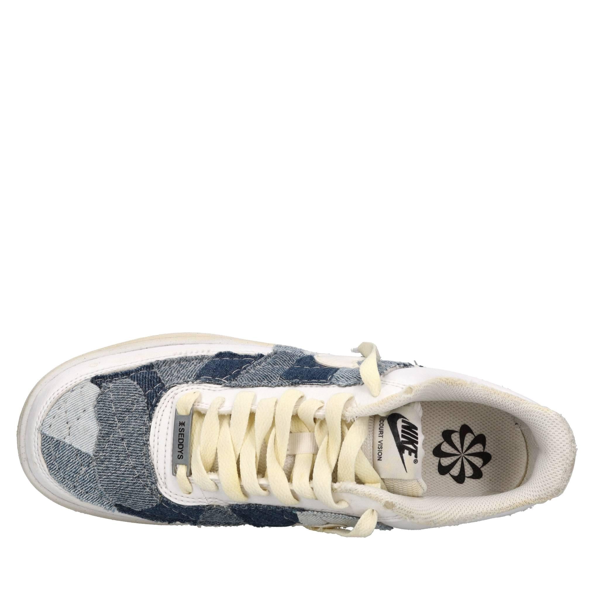 Sneakers in ecopelle e tessuto 