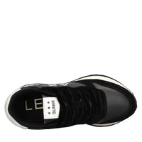 Sneakers in pelle, tessuto ed ecopelle 